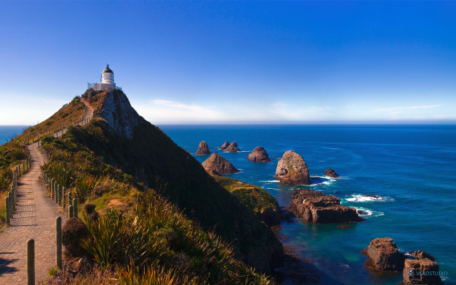 Lighthouse hill ocean path tiltshift free wallpaper for desktop - medium preview image