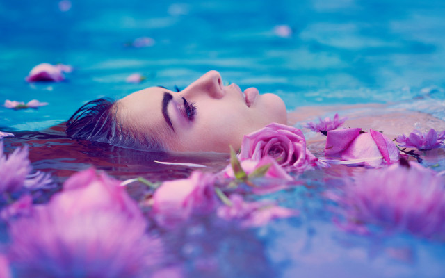 Woman floating pink flowers underwater free wallpaper for desktop - medium preview image