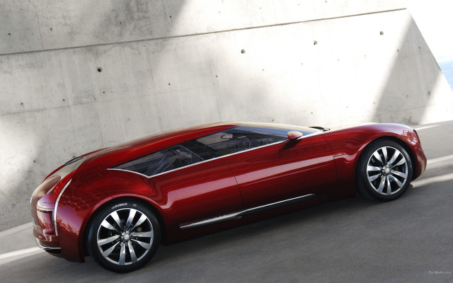 Red car driving next to free wallpaper for desktop - medium preview image