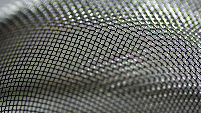 Metal mesh honeycomb blurry light free wallpaper for desktop - medium preview image