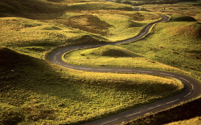 Winding road green hills lush free wallpaper for desktop - medium preview image