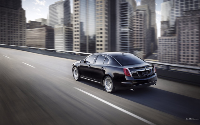 Black car city street blue free wallpaper for desktop - medium preview image