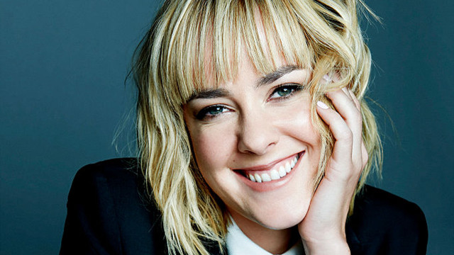 Blonde woman smiling hands on free wallpaper for desktop - medium preview image