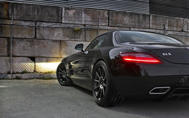 Black sports car brick wall #5 free wallpaper for desktop - medium preview image