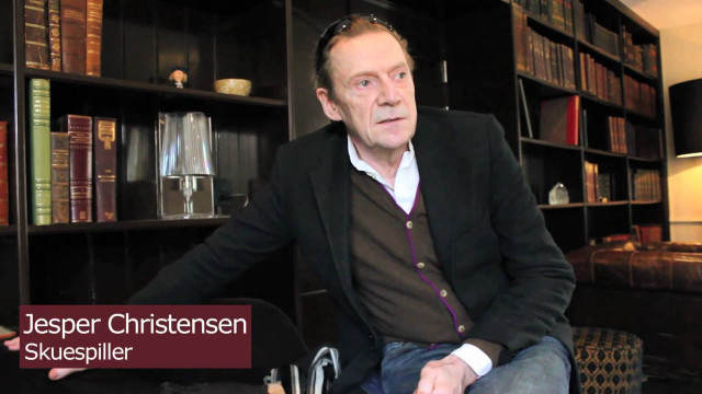 Man sitting chair book shelf free wallpaper for desktop - medium preview image