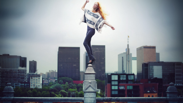 Woman pole city fashion balance free wallpaper for desktop - medium preview image