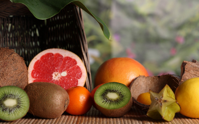 Fruit basket oranges kiwis stilllife free wallpaper for desktop - medium preview image