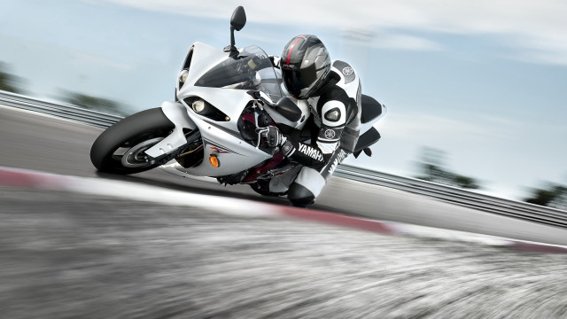 Motorcycle rider track sky blur free wallpaper for desktop - medium preview image