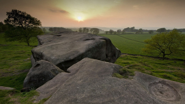 Rock formation grassy field sunset #2 free wallpaper for desktop - medium preview image