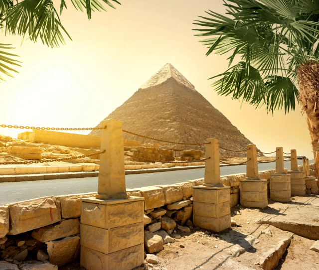 Stone wall pyramid palm tree free wallpaper for desktop - medium preview image