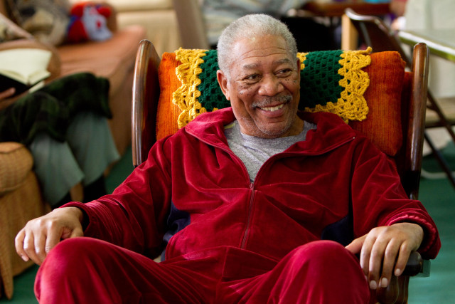 Man red jacket smiling chair free wallpaper for desktop - medium preview image