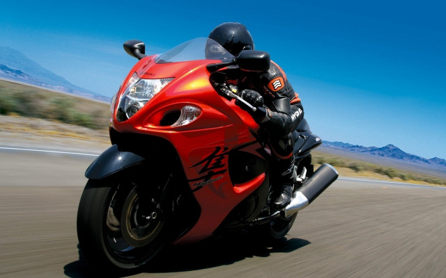 Red motorcycle desert mountains sky free wallpaper for desktop - medium preview image