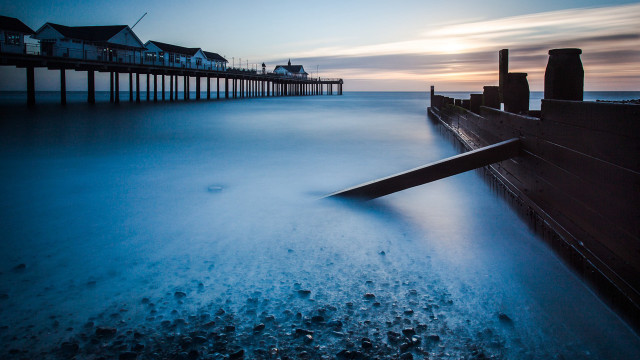 Long pier houses ocean sky free wallpaper for desktop - medium preview image