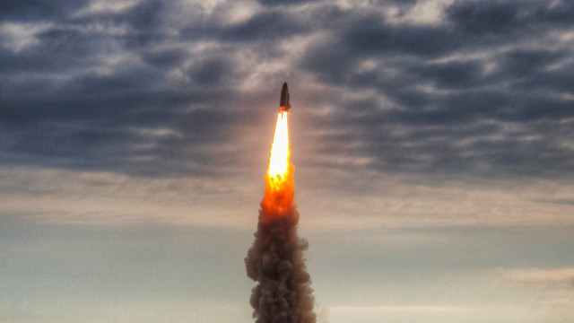 Rocket launch smoke cloudy sky free wallpaper for desktop - medium preview image