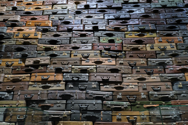 Luggage pile liminal space postminimalism free wallpaper for desktop - medium preview image