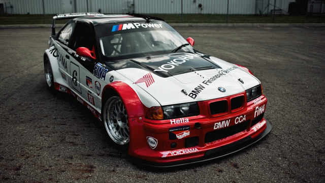 Bmw race car parked 3d free wallpaper for desktop - medium preview image