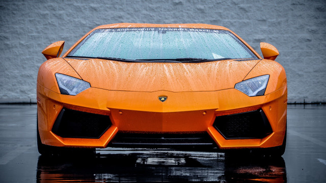 Orange sports car parking lot #7 free wallpaper for desktop - medium preview image