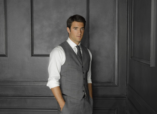 Man suit tie standing room free wallpaper for desktop - medium preview image