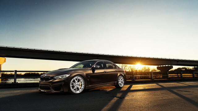 Brown car parked near bridge free wallpaper for desktop - medium preview image