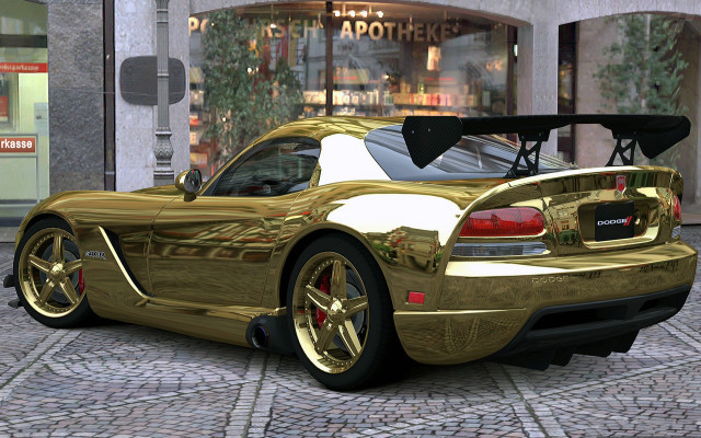 Gold sports car cobblestone street free wallpaper for desktop - medium preview image