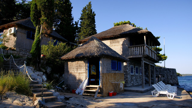 Thatched house ocean hammock ecological free wallpaper for desktop - medium preview image