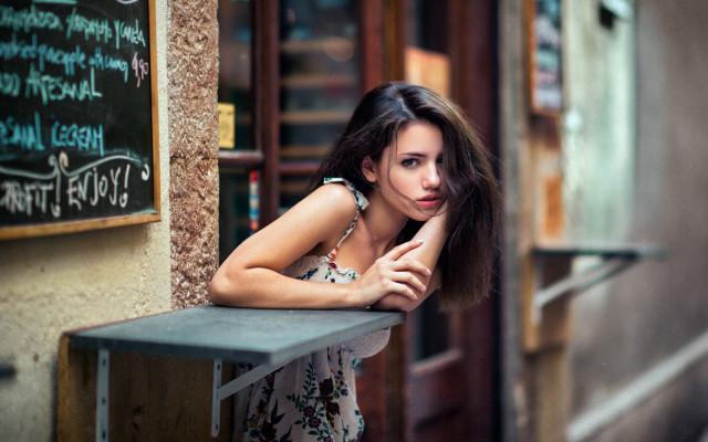 Woman leaning table chalkboard writing free wallpaper for desktop - medium preview image