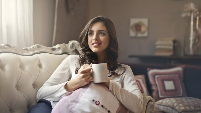 Woman sitting coffee mug pillow free wallpaper for desktop - medium preview image