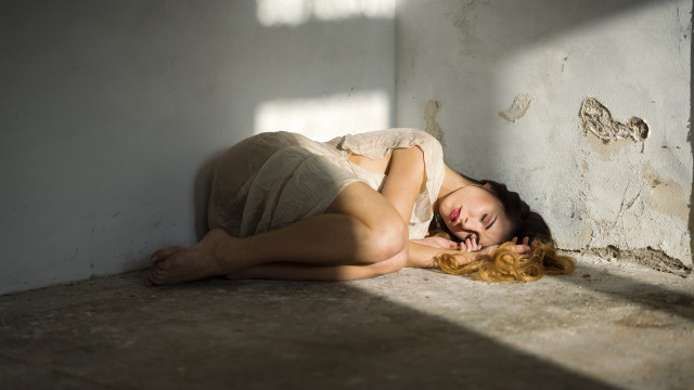 Woman lying floor window behind free wallpaper for desktop - medium preview image