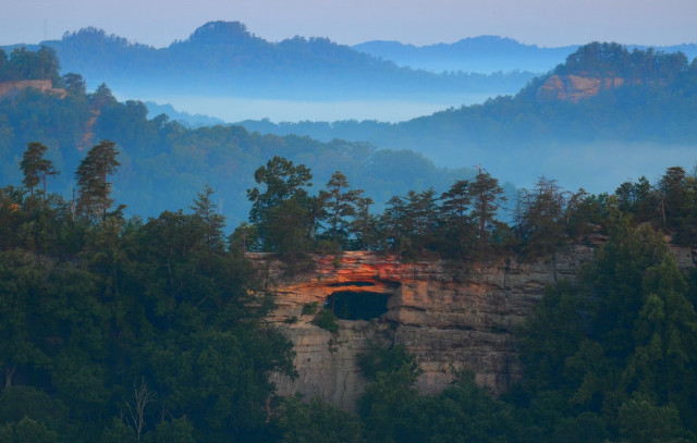 Mountain cave forest fog sunset free wallpaper for desktop - medium preview image