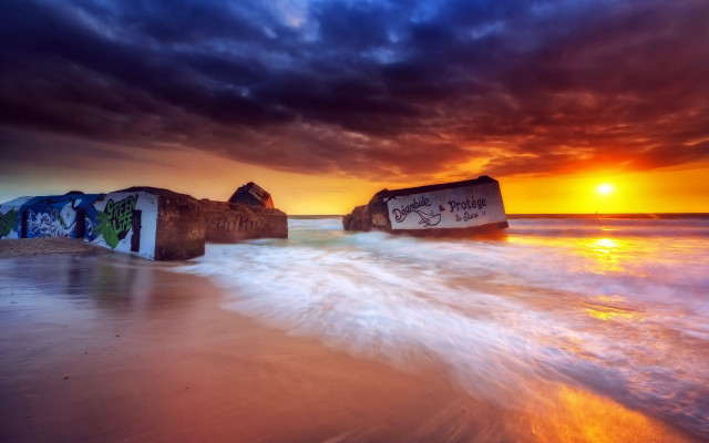 Sunset beach rock graffiti cinematic free wallpaper for desktop - medium preview image