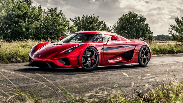 Red sports car driving forest #5 free wallpaper for desktop - medium preview image