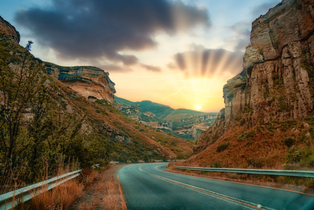 Mountain road sunset skyline ocean free wallpaper for desktop - medium preview image