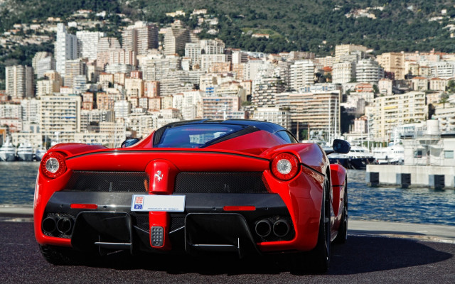 Red sports car city lake free wallpaper for desktop - medium preview image