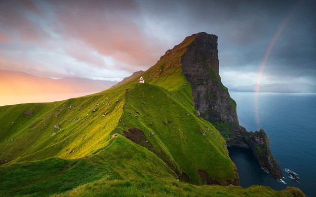 Rainbow over grassy mountains landscape free wallpaper for desktop - medium preview image