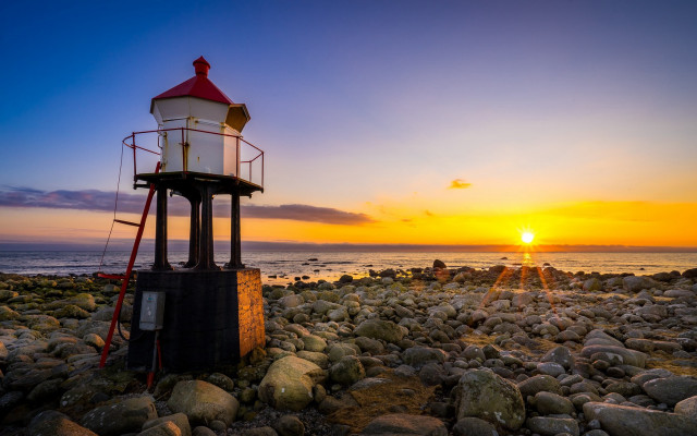 Lighthouse rocky beach sunset ocean #2 free wallpaper for desktop - medium preview image