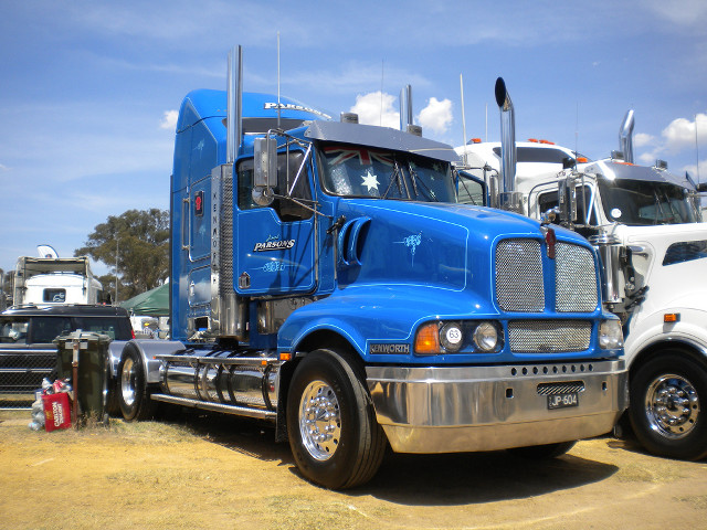 Blue truck field mountains vehicle free wallpaper for desktop - medium preview image