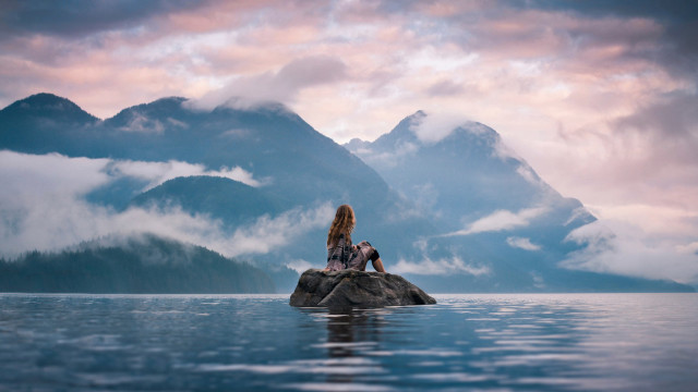 Woman rock lake mountains clouds free wallpaper for desktop - medium preview image
