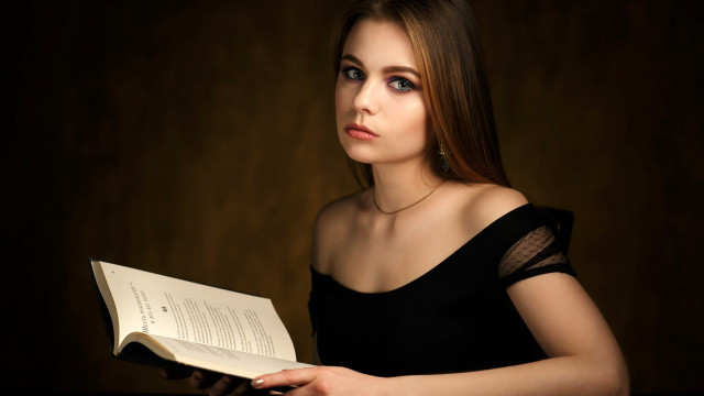 Woman black dress holding book #2 free wallpaper for desktop - medium preview image
