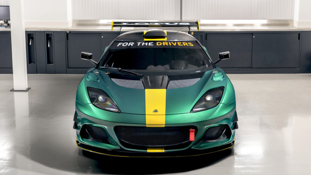 Green yellow sports car garage free wallpaper for desktop - medium preview image