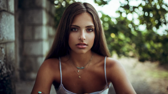 Woman longhair necklace outdoors bokeh free wallpaper for desktop - medium preview image