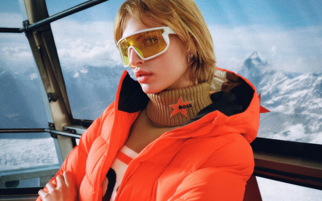 Woman orange jacket sunglasses mountains free wallpaper for desktop - medium preview image