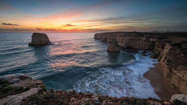 Sunset ocean cliff water beach free wallpaper for desktop - medium preview image