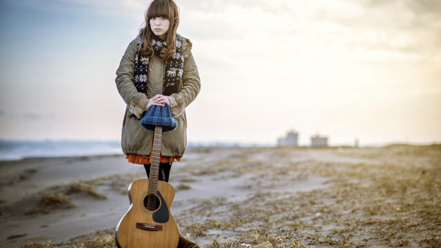 Beach guitar woman sunset horizon free wallpaper for desktop - medium preview image