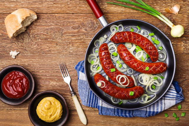 Sausages onions mustard wooden table free wallpaper for desktop - medium preview image