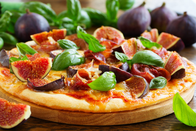 Pizza olives cheese woodenboard greenleaves free wallpaper for desktop - medium preview image