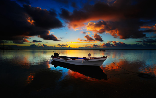 Boat sunset clouds water person free wallpaper for desktop - medium preview image
