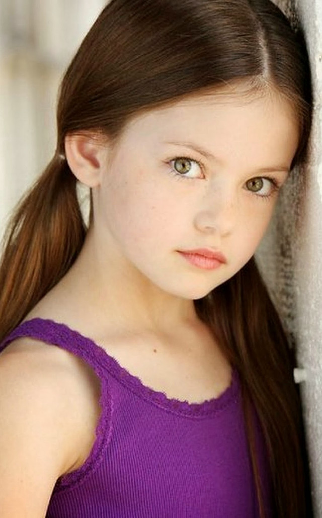 Young girl long hair serious #2 free wallpaper for mobile - medium preview image