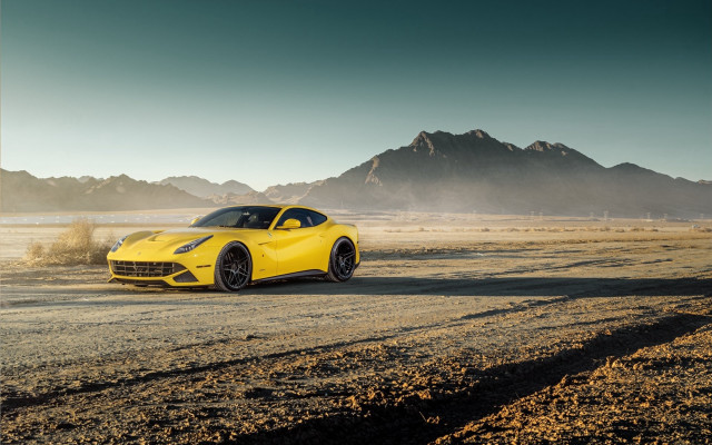 Yellow sports car desert mountains free wallpaper for desktop - medium preview image