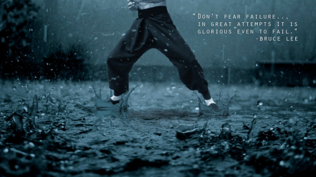 Man jumping rain umbrella night free wallpaper for desktop - medium preview image