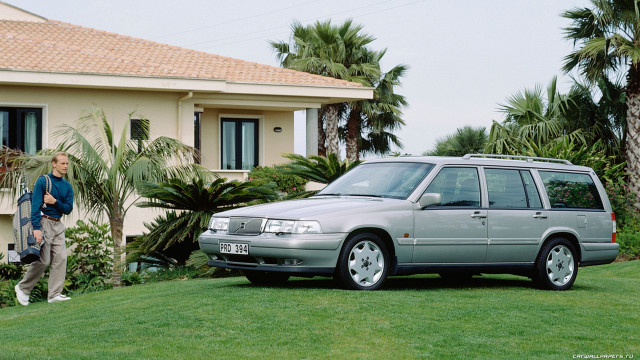 Man passing car house palm free wallpaper for desktop - medium preview image